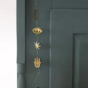 Girlang med guld symboler & pärla
