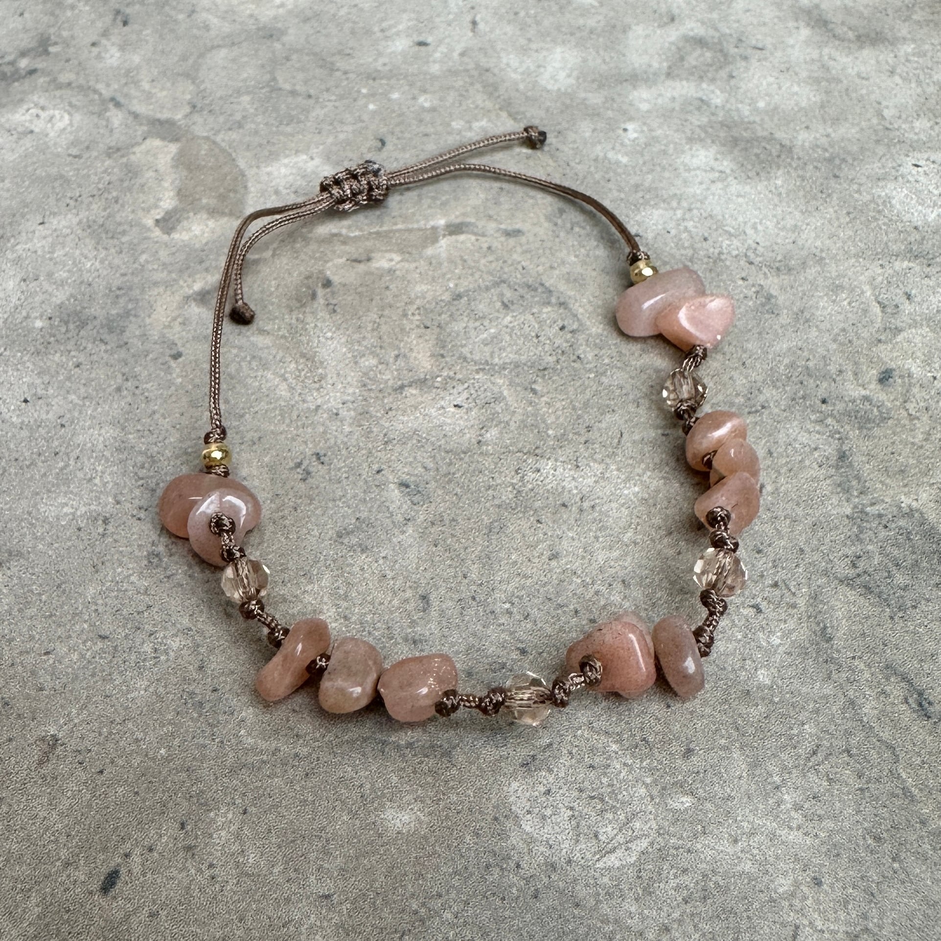 Solsten, armband guldpärlor